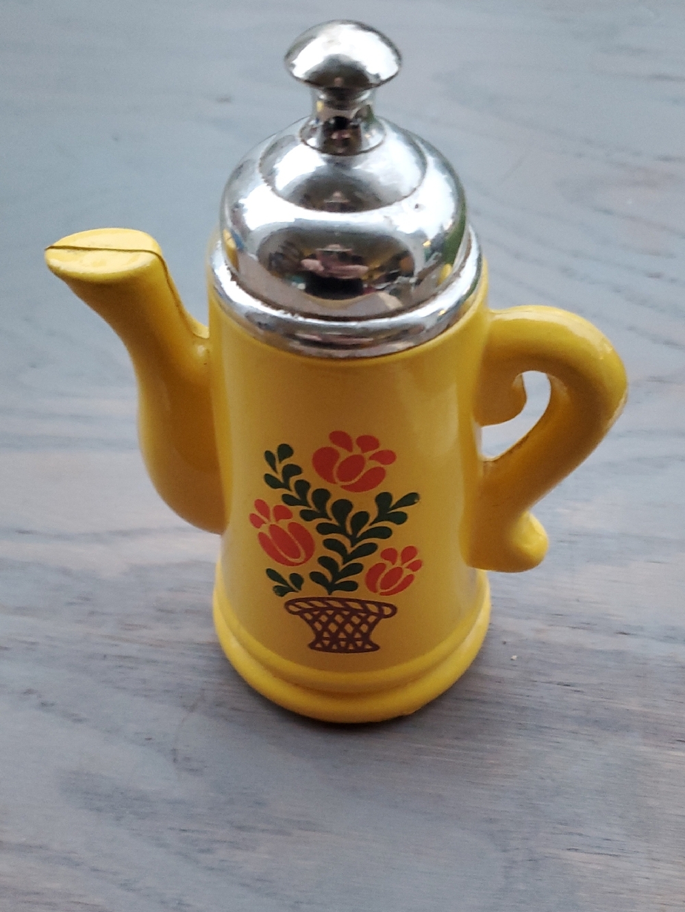 Avon Yellow Ceramic Oil Pourer with Floral Basket Motif and Silver Lid